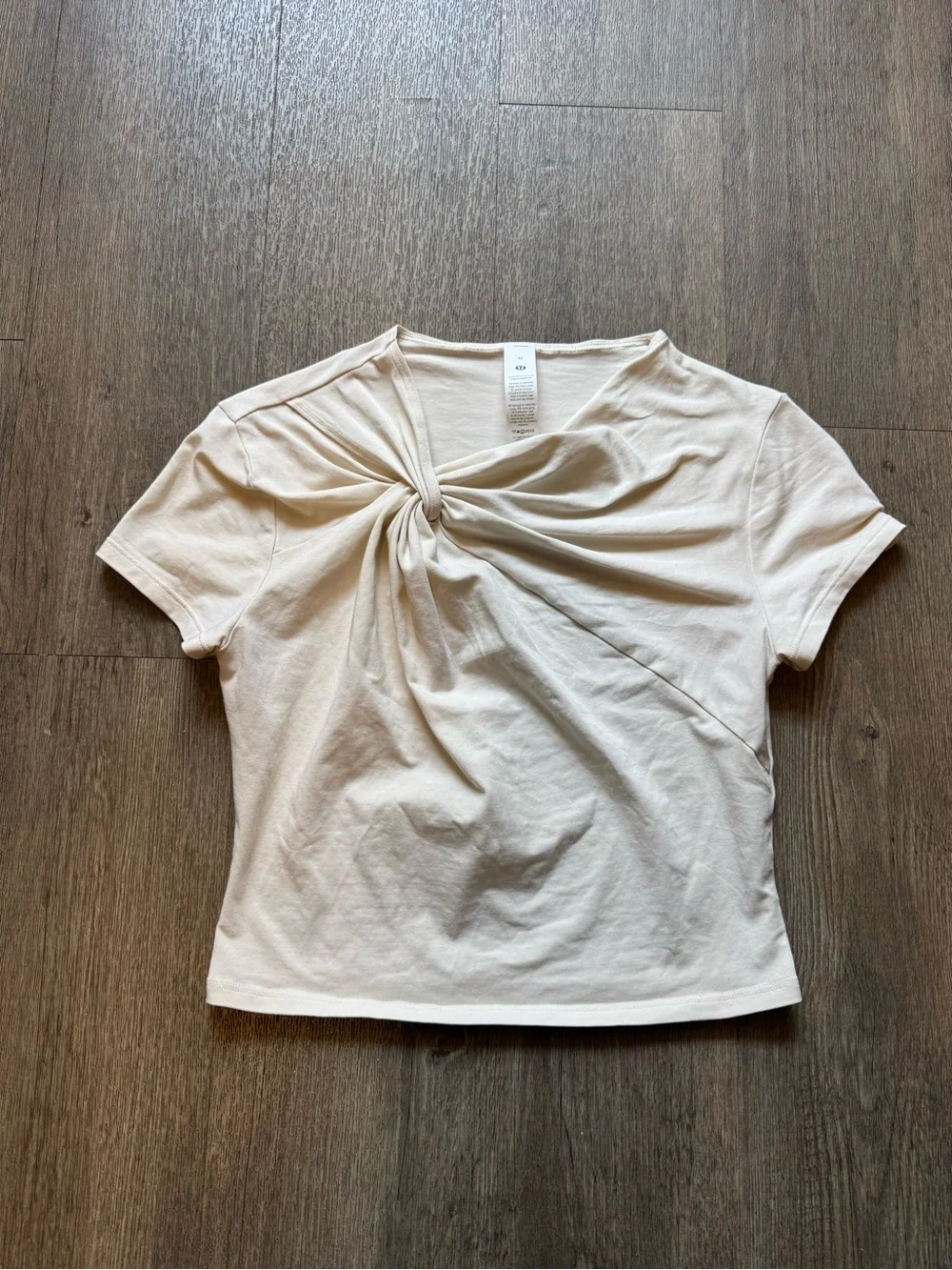 Lululemon asymmetric front-twist top in cream/bone color  Size M